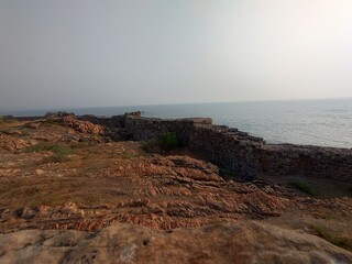 Ancient Stone Wall on Sea Fort Overlooking the Ocean