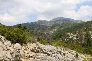 Mountain landscape with cloudy sky. Travel through Provence and the Alpes-Maritimes in France