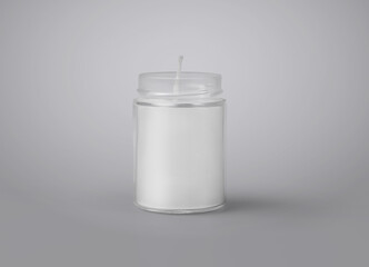 Mockup of a white wax candle in a glass jar, isolated on a background.