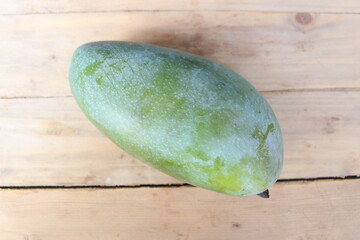 mango on a wooden table