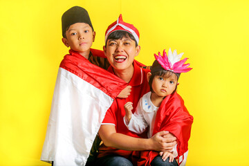 A happy family celebrating Indonesian Independence full of prode and joy. 