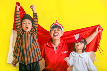 A happy family celebrating Indonesian Independence full of prode and joy. 