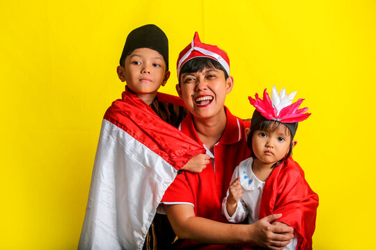 A happy family celebrating Indonesian Independence full of prode and joy. 