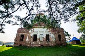 The dilapidated building of the Cathedral of St. John the Baptist in Verkhnyaya Barancha, in the Middle Urals.