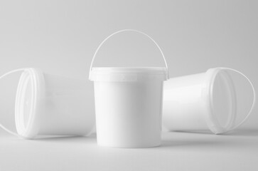 Plastic paint or food bucket tub container mockup on neutral background