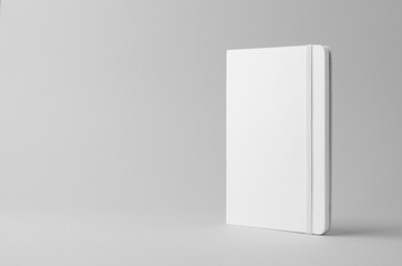 White hardcover notebook mockup on neutral background