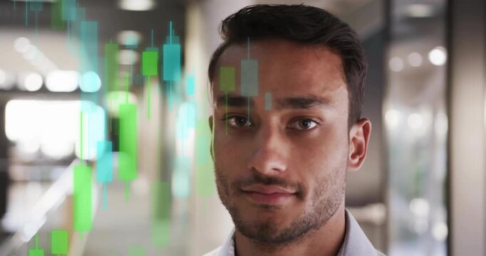Man standing in office seeing stock chart fading in while processing financial data and smiling - Powered by Adobe