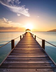Obraz premium Wooden pier extending to ocean sunset