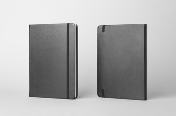 Notebook mockup showing front and back cover on a gray background
