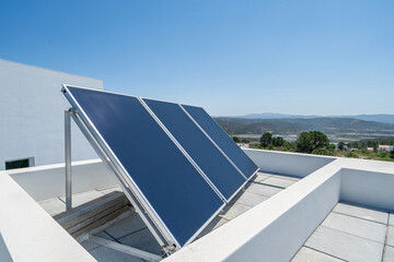 Solar panel on a roof top from a house. Home sustainable power energy ecological concept.