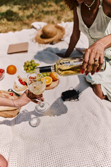 Enjoying a delightful summer picnic with friends in a sunny park setting