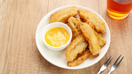 Fried banana with kaya jam or pisang goreng selai srikaya, Indonesian food

