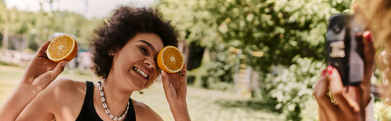 Joyful summer picnic with best friends enjoying laughter and fun in the park
