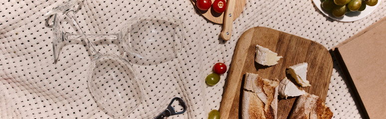 Delicious summer picnic spread on a cozy blanket in a serene park setting