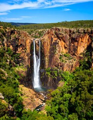 Waterfall cascading down rocky cliffs (3)