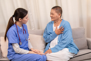 Fototapeta premium Caregiver in clinic consultation support, compassionate Nurse handhold senior patient at home shows trust communication, aging wellness journey, gentle touch reassures emotion, anxiety recovery