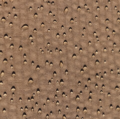 drops of water on cardboard