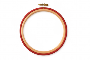 Wooden embroidery hoop in red and beige, hanging against transparent backdrop, highlighting handmade crafting accessories