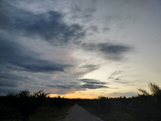 Fototapeta premium sunset in the clouds fron work