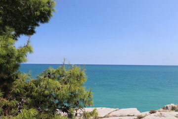 Blue Mediterranean Sea contrasting with the light blue of the sky