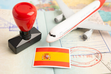 Spain passport with approved stamp on document for tourism to immigration at airport in country.