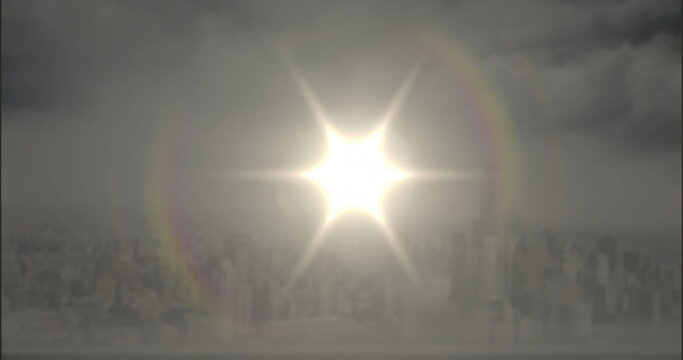 Shining sun emitting starburst rays over city skyline, with lens flare rings and skyscrapers