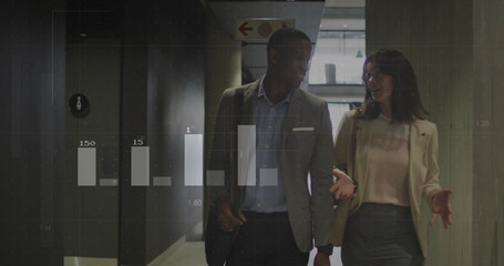 Walking colleagues in business attire carrying shoulder bag in office corridor with data overlays