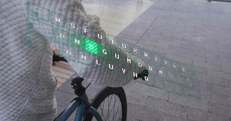 Standing man in off-white sweater beside bicycle on pier, interacting with green virtual keyboard