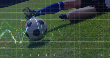 Sliding defender wearing blue socks tackling opponent on pitch, with soccer ball and data overlay