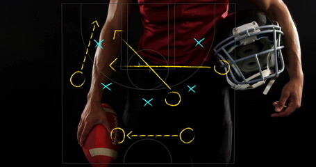 Gripping football and helmet, adult male player posing in sports studio with play diagram overlay