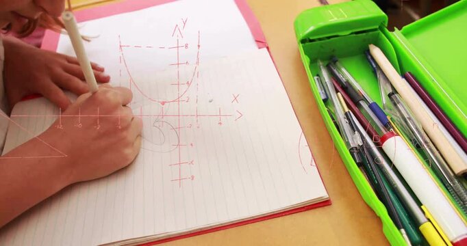 Girl opening notebook and drawing math diagrams formulas then grabbing colored pens for education