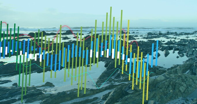 Multicolored data bars and trend lines emerging over rocky shoreline at low tide, with tide pools - Powered by Adobe