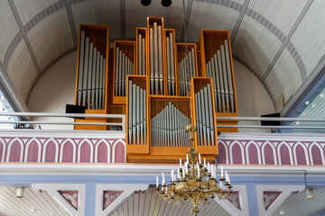 Interior view of the Lutheran Cathedral in Hanko, Finland, the pipe organ inside, showcasing...