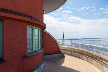 Observation deck of the red Hanko Water Tower in Finland on a sunny day, offering breathtaking...