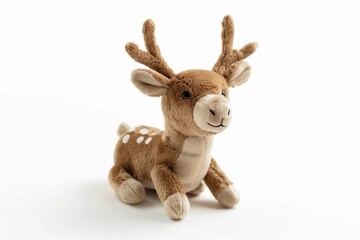 Obraz premium Cute plush deer toy with antlers sitting on a plain white background perfect for children or as a decorative item
