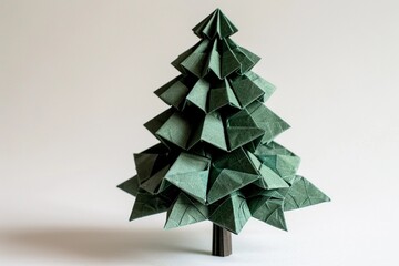 Beautifully crafted origami tree made from green paper showcasing intricate folding techniques and artistic design