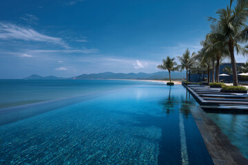 Fototapeta premium A beautiful pool with a blue water and a clear sky