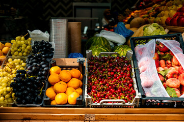 fruits and vegetables are on display at a street vendor