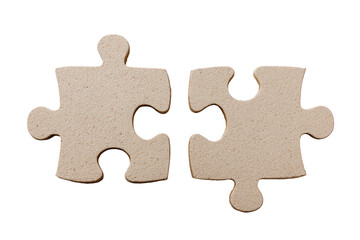 Obraz premium Two light beige puzzle pieces, interlocking