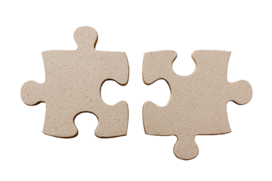 Two light beige puzzle pieces, interlocking