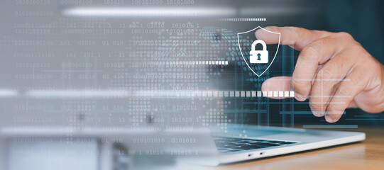 Secure Internet access and data protection from hackers and cybercrime. Businessman uses computer...