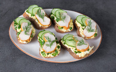 Homemade sandwiches with chicken balyk, cucumber and green onion