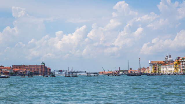 View of the Venetian Laguna, seen from the Giudecca Island, with Marghera Refinery in the background.  Worldwide famous, Venezia is a unique kind of city and UNESCO site.