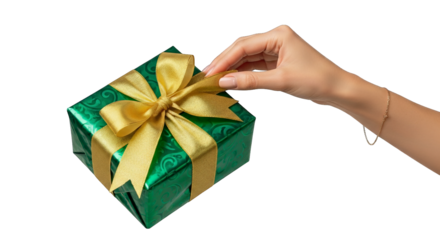 Elegant woman's hand delicately unties a shimmering gold ribbon on a luxuriously wrapped gift box.