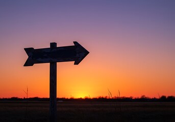 Sunset Decision: Silhouetted Signpost at Dusk