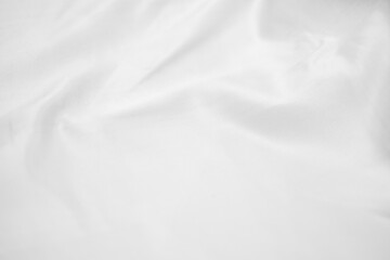 Abstract White Bedding Sheets or White wrinkled fabric background texture and Texture with copy-space :Creased or wrinkled white fabric,Soft focus
