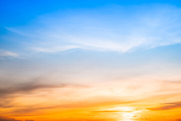 Beautiful , luxury soft gradient orange gold clouds and sunlight on the blue sky perfect for the background, take in evening,Twilight, Large size, high definition landscape photo