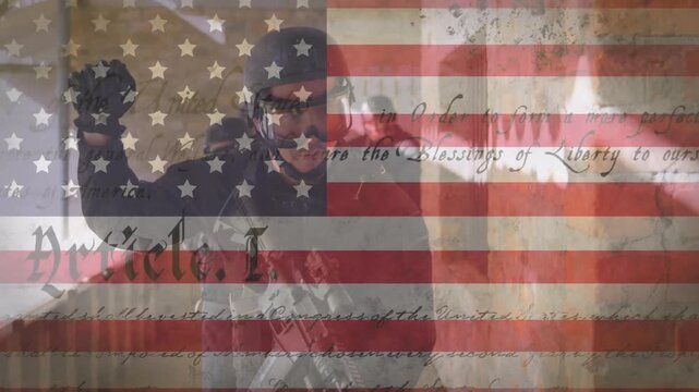 Tactical operative gripping baton surveying corridor raising baton overhead before clearing path