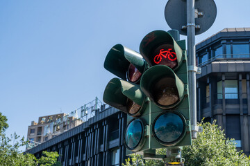 Traffic stop light for cyclists. The red signal is on bicycle.