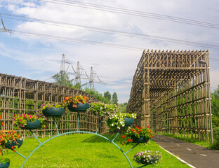 wooden roof over the bike path in the park, protects against possible falling wire of power lines